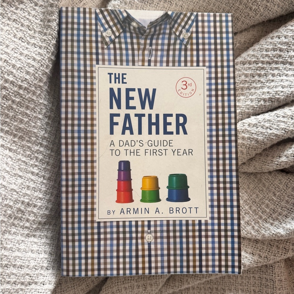 The New Father: A Dad's Guide to the First Year Book